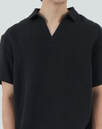 Load image into Gallery viewer, BUTTONLESS POLO in waffled black
