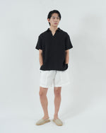 Load image into Gallery viewer, BUTTONLESS POLO in waffled black
