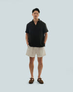 Load image into Gallery viewer, BUTTONLESS POLO in waffled black
