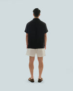 Load image into Gallery viewer, BUTTONLESS POLO in waffled black
