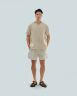 Load image into Gallery viewer, BUTTONLESS POLO in waffled cream
