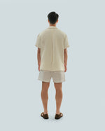 Load image into Gallery viewer, BUTTONLESS POLO in waffled cream
