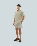 Load image into Gallery viewer, BUTTONLESS POLO in waffled cream
