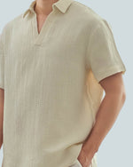 Load image into Gallery viewer, BUTTONLESS POLO in waffled cream
