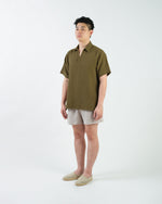 Load image into Gallery viewer, BUTTONLESS POLO in waffled olive
