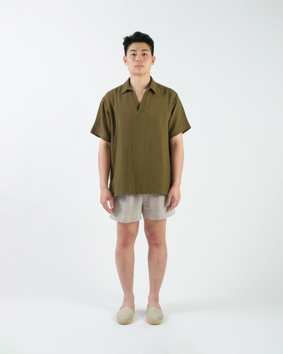 BUTTONLESS POLO in waffled olive