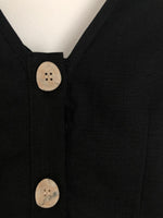 Load image into Gallery viewer, ASYMMETRICAL SHOULDER TEA DRESS in black
